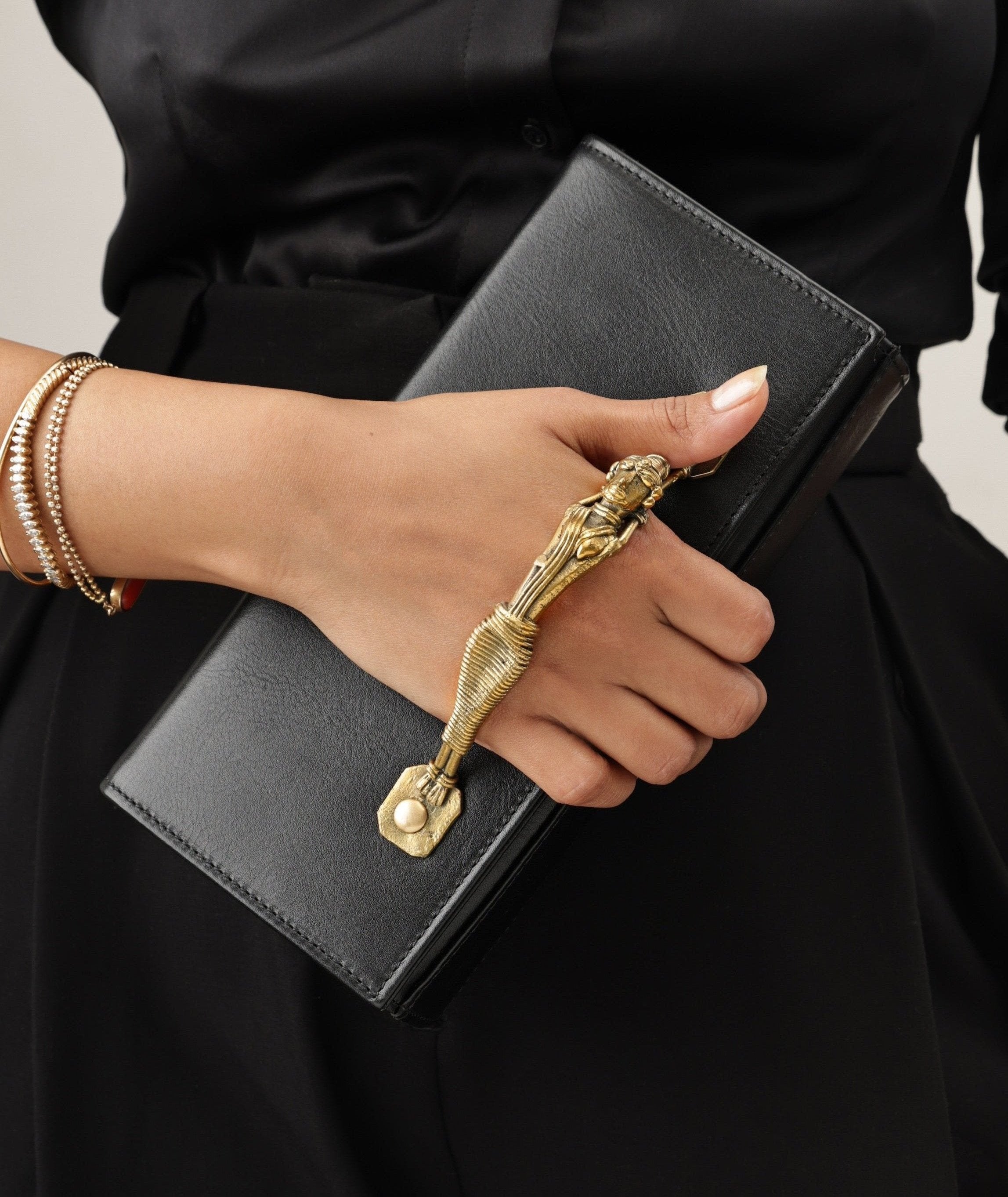 Handcrafted Leather Clutch Bag with Dokra Handle – Unique Artisan Design