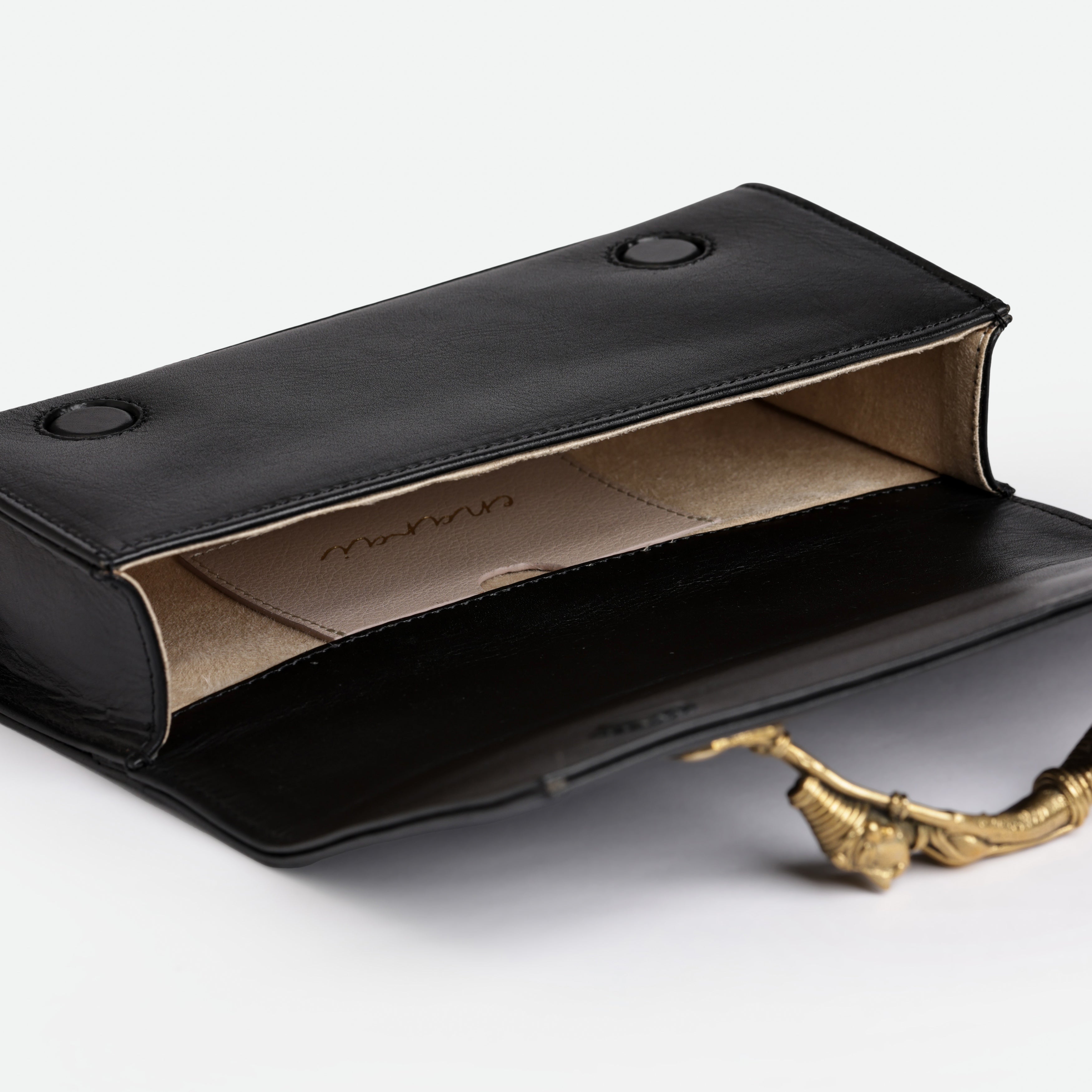 Handcrafted Leather Clutch Bag with Dokra Handle – Unique Artisan Design