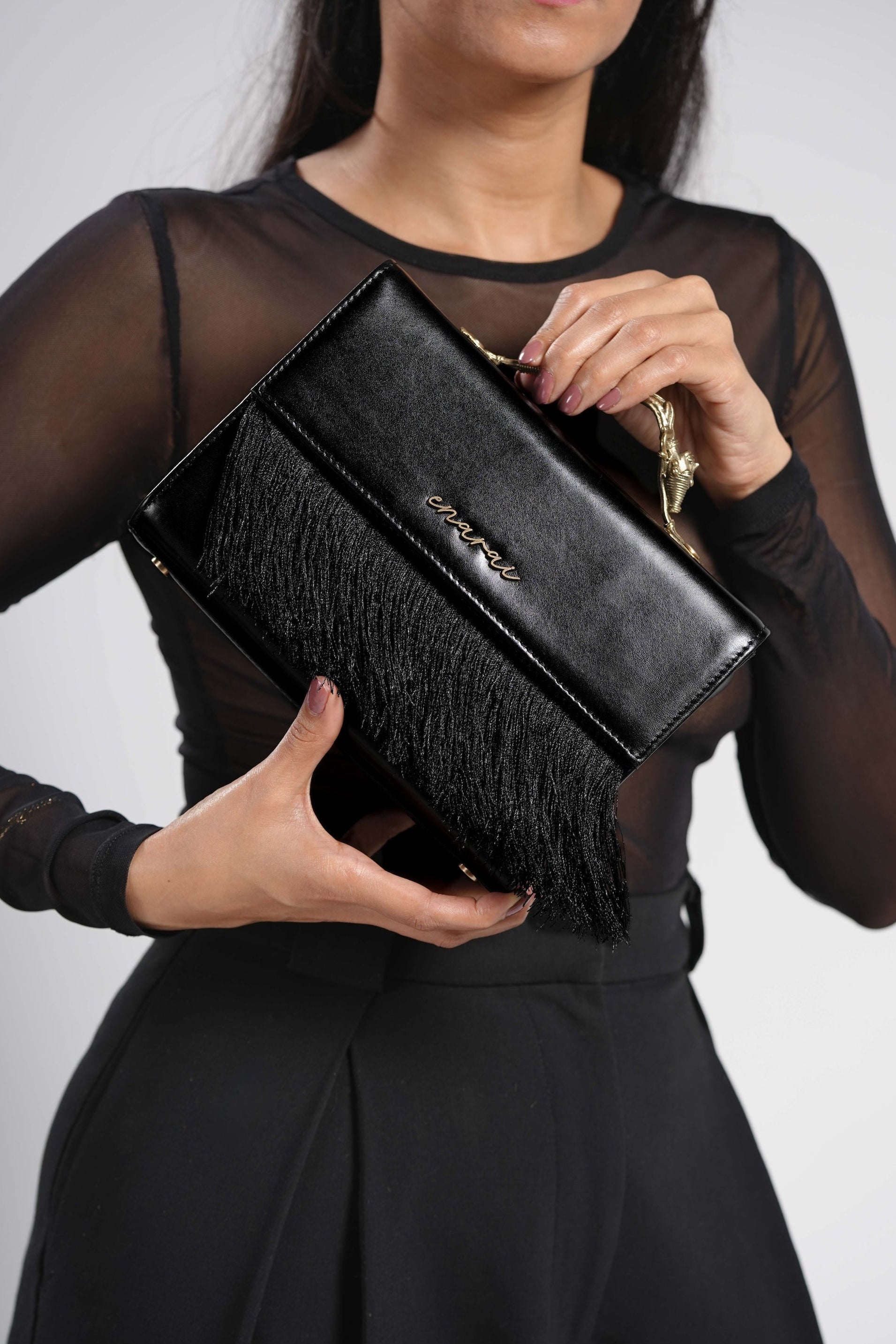 enarai Mayur Noir Leather Top Handle Bag with Dokra Metal casting – sustainable luxury tribal artisan crafted 